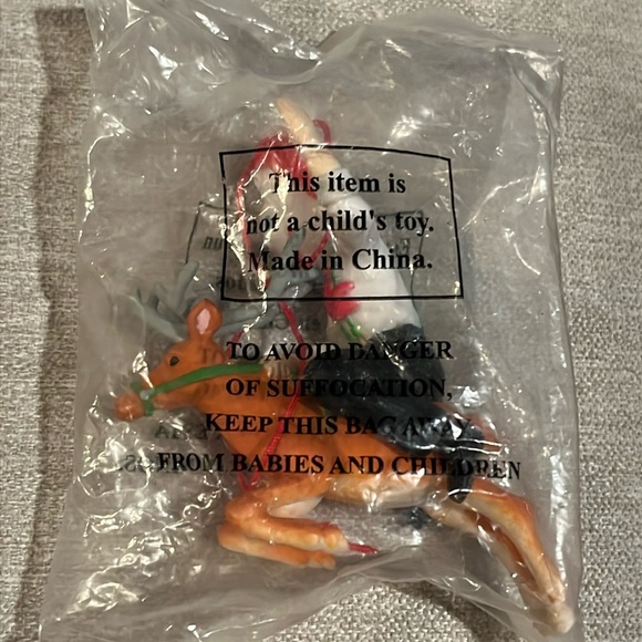 Jack in the Box Riding Reindeer Christmas Ornament - Picture 1 of 3